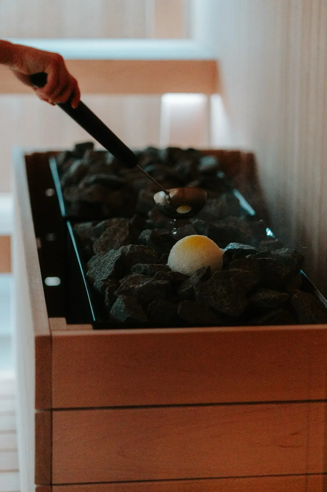 Stones and heater in the Aufguss sauna